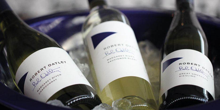 Robert Oatley Signature Series white wines chilling on a large blue bucket of ice