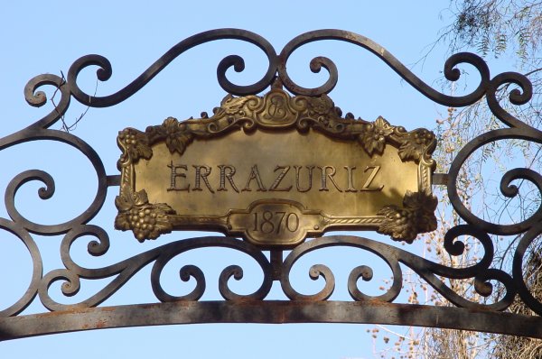 Metal gate Errazuriz name plate at entrance to original 1870 winery