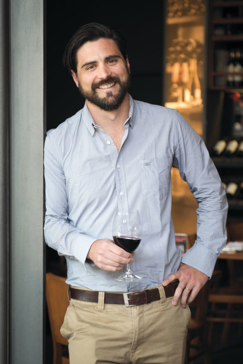 Rodrigo Zamorano - Chief Winemaker - leaning on a doorframe at the winery
